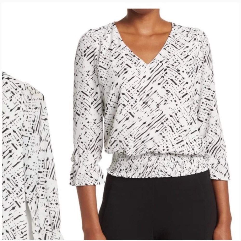 Philosophy White with Black Top